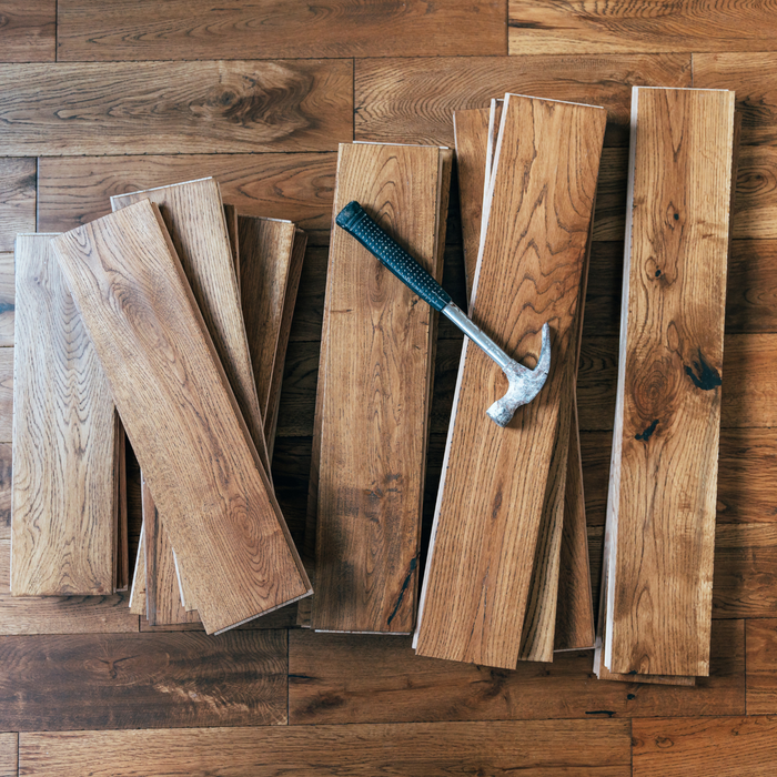 Oak wood floor slabs and hammer