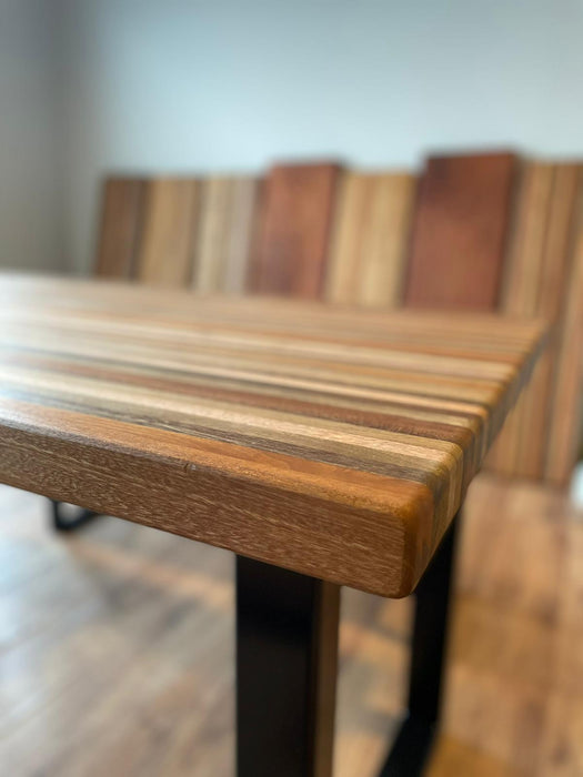 This is the Singapore Special solid wood table. Made from 9 species of the local trees. 